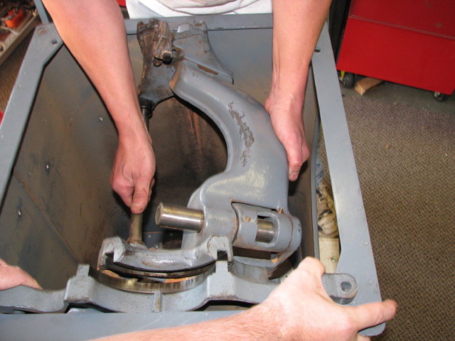 Separate the yoke from the front trunnion bracket