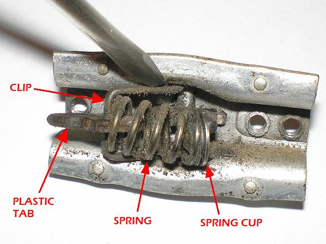 Removing clip and spring