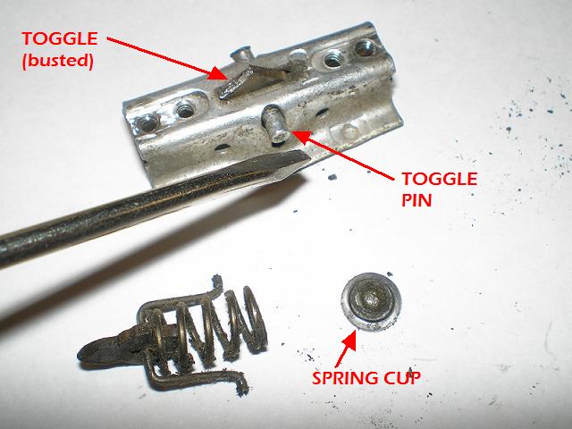 Disassembled clip and spring