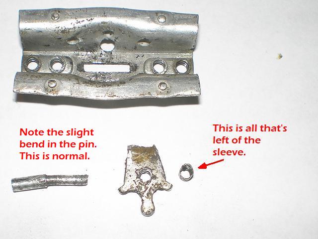 Pin and remnants of sleeve